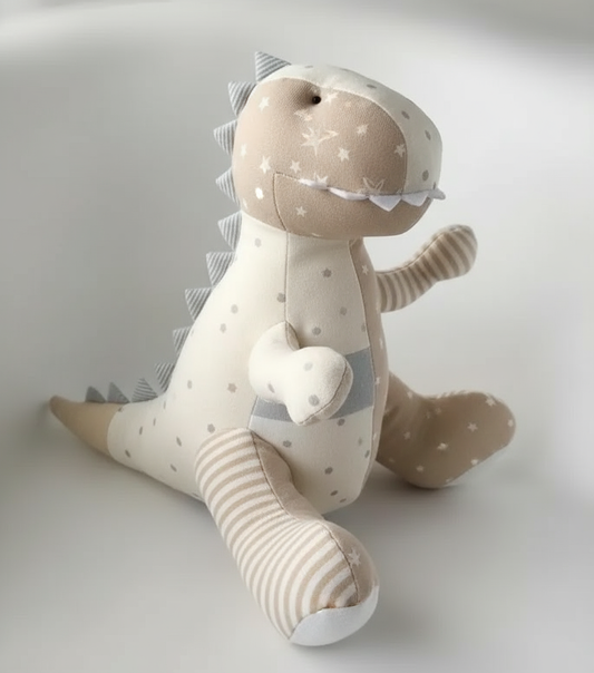Keepsake dinosaurus v neutrálních barvách - boční pohled